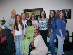 EOTC's Elaine Donly (far left) greets women in her transitions group.